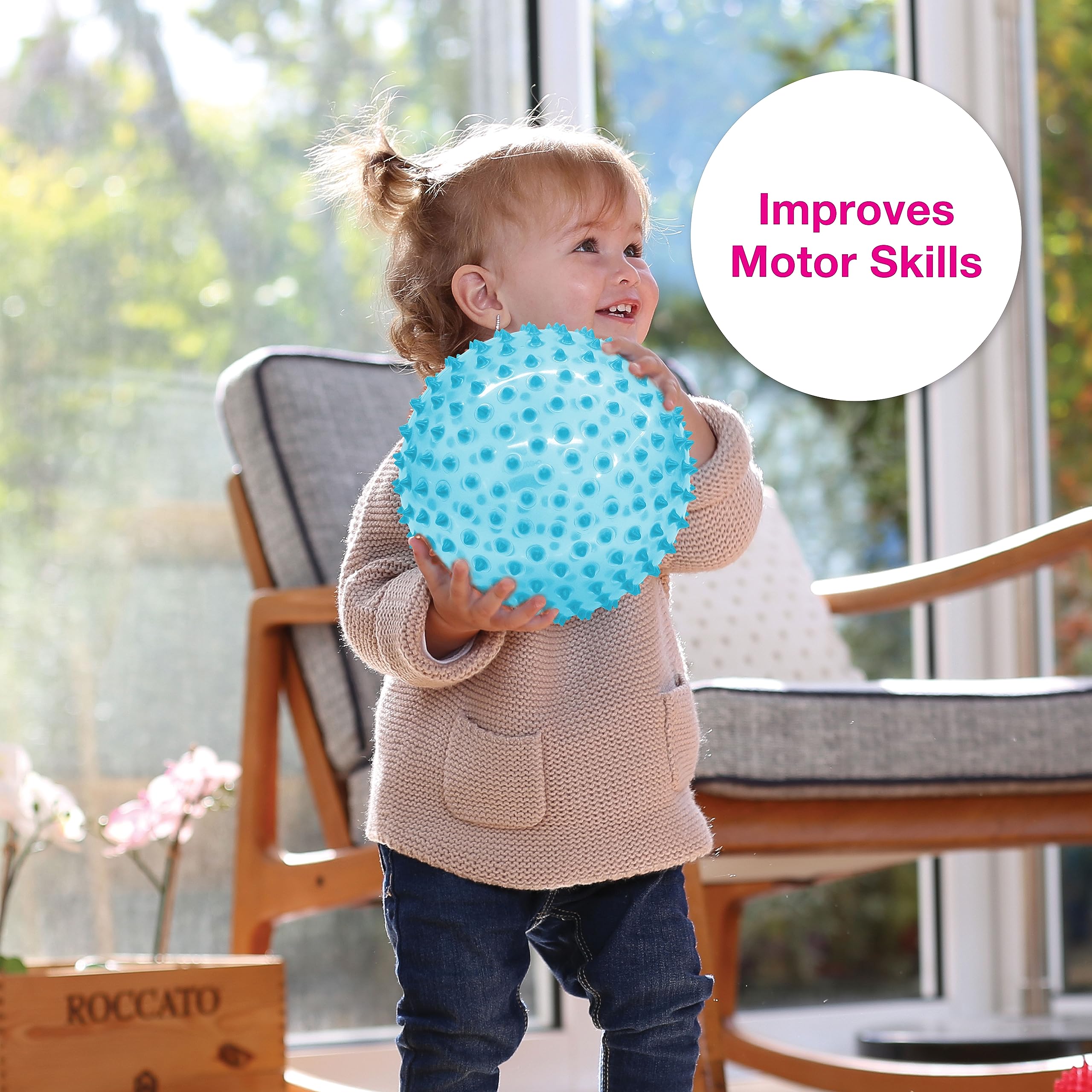 Edushape sensory ball fosters hand-eye coordination through rolling and tracking.