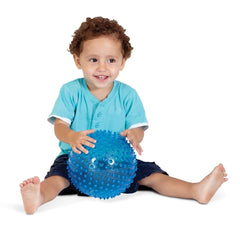 Edushape sensory ball's grip-friendly surface aids safe handling during play.