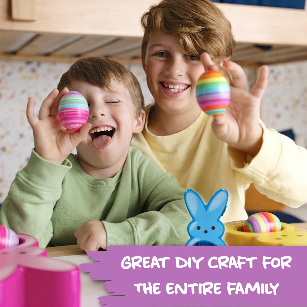 The Eggmazing decorating large eggs during a family craft session