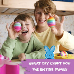 The Eggmazing decorating large eggs during a family craft session