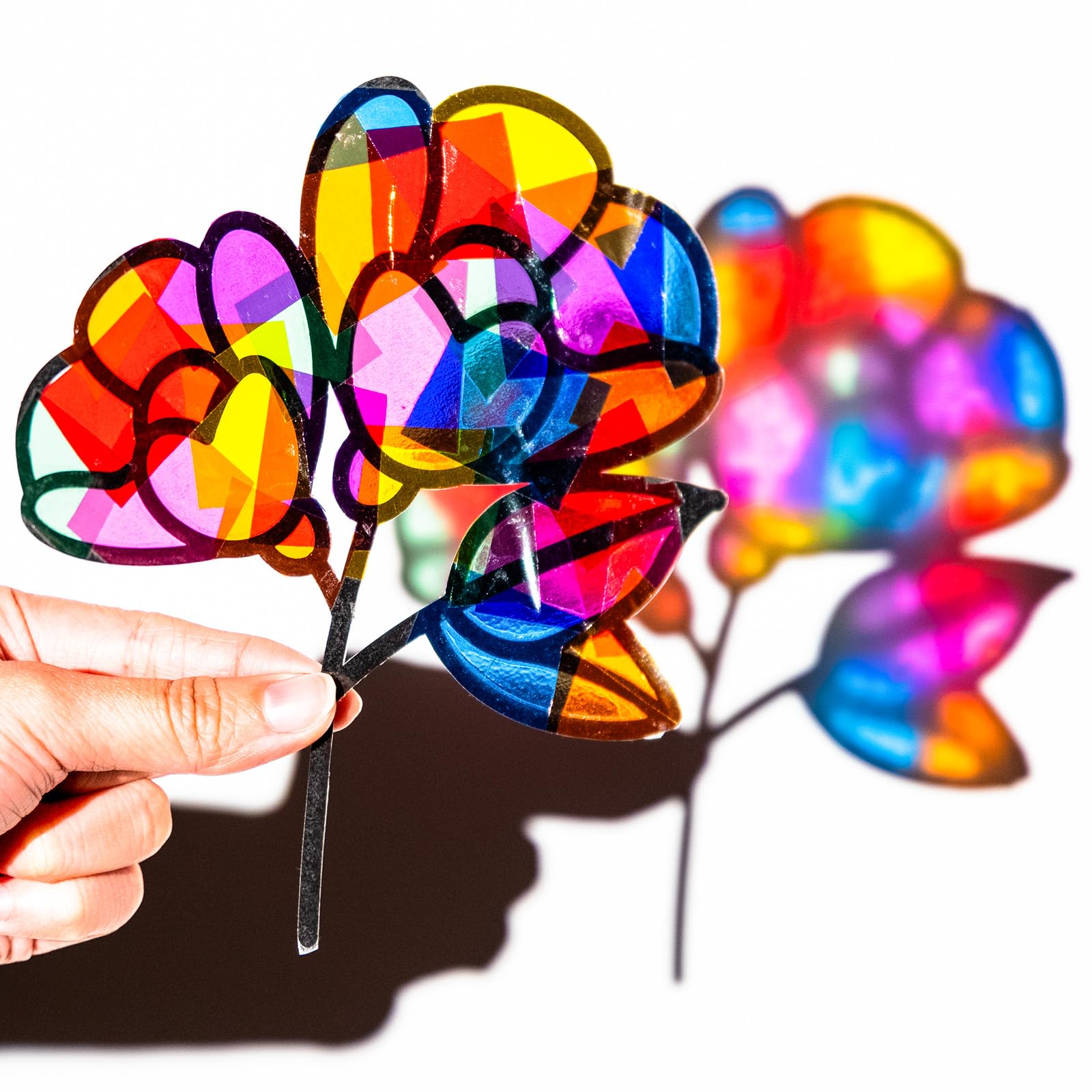 EggSun suncatchers kit with glitter papers adds dazzling stained-glass effects.