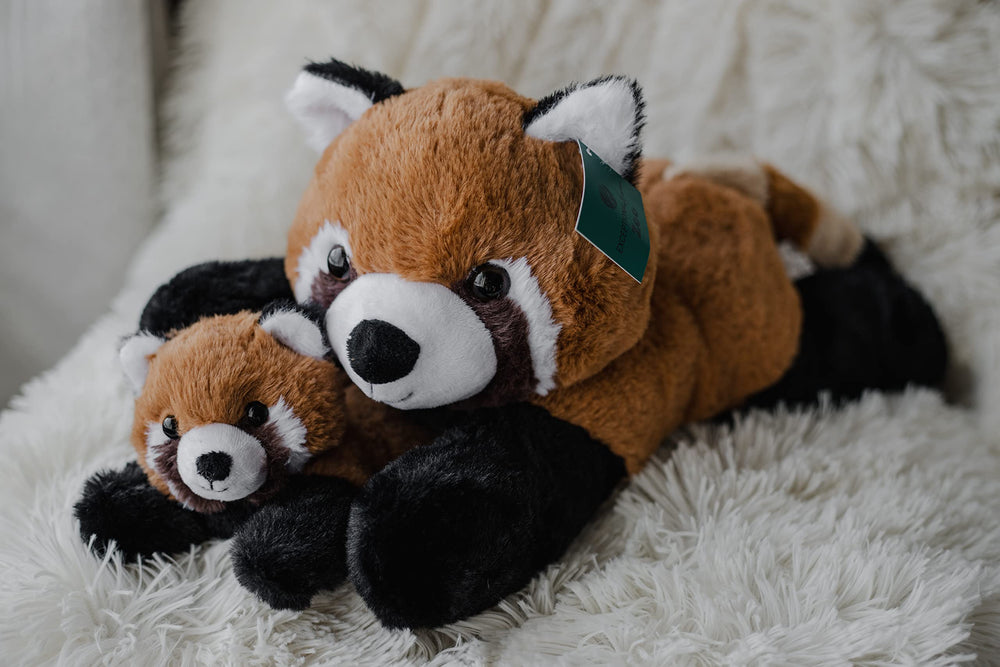 EH Exceptional Home panda plush toy on a shelf for playful decor.