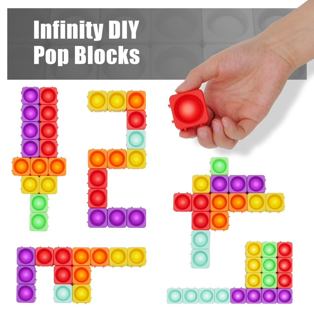 Ejanmilar blocks assembled into creative shapes on a board for problem-solving.