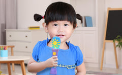ekids Ms Rachel microphone held by toddler for sparkling pretend concerts