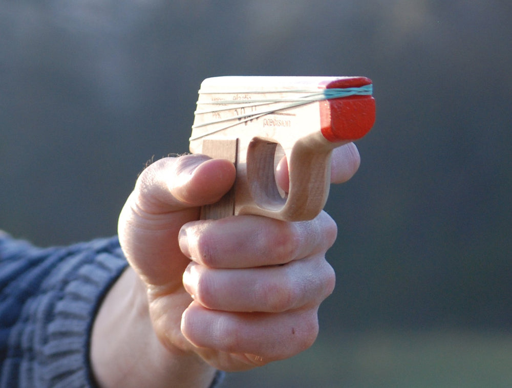 Elastic Precision PPK maple grip close-up shows durable hardwood with smooth finish
