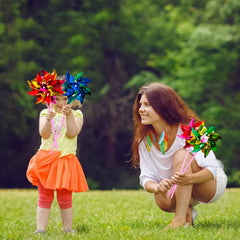 Elcoho party windmill decor enhances lawn celebrations with playful motion.