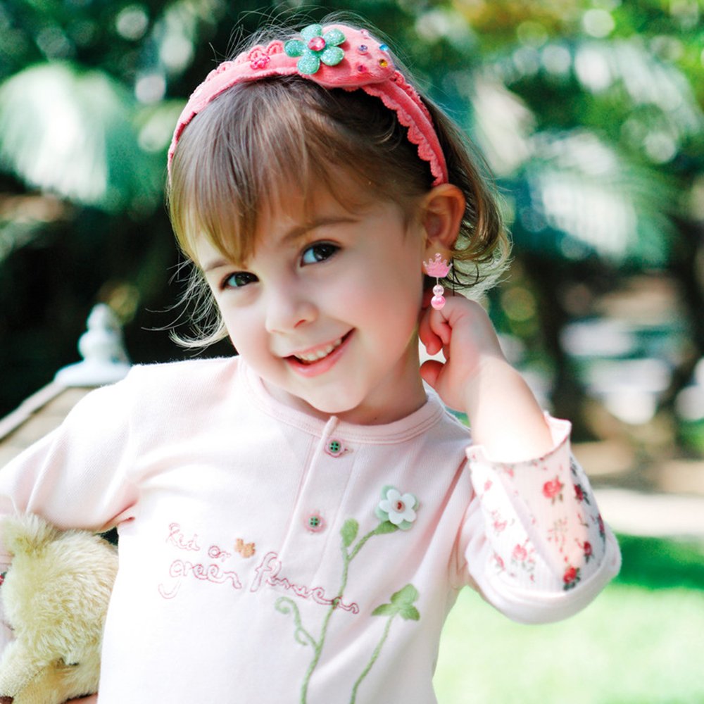 Elesa Miracle clip-on earrings toddler dress-up view suggests easy wearing and pretend play.