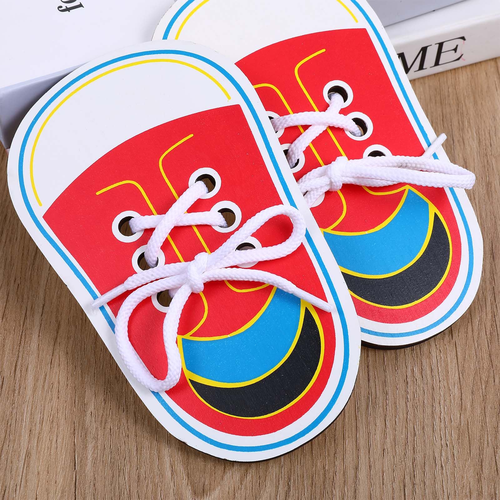 ElevateTech wooden lacing board threading action demonstrating hand-eye coordination development