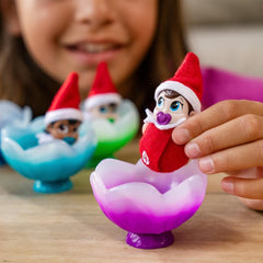 Elf on the Shelf Frost Pips Frost Flower Cradle showcases gentle warmth for baby elves.