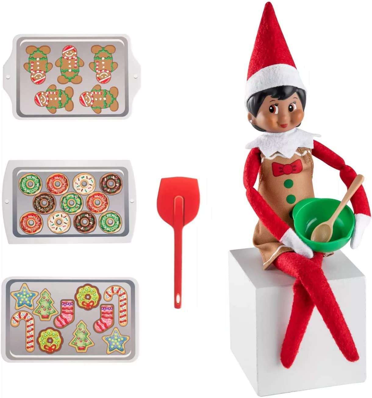 The Elf on the Shelf Itty Bitty Baker outfit gingerbread apron highlights festive play and imaginative cooking.