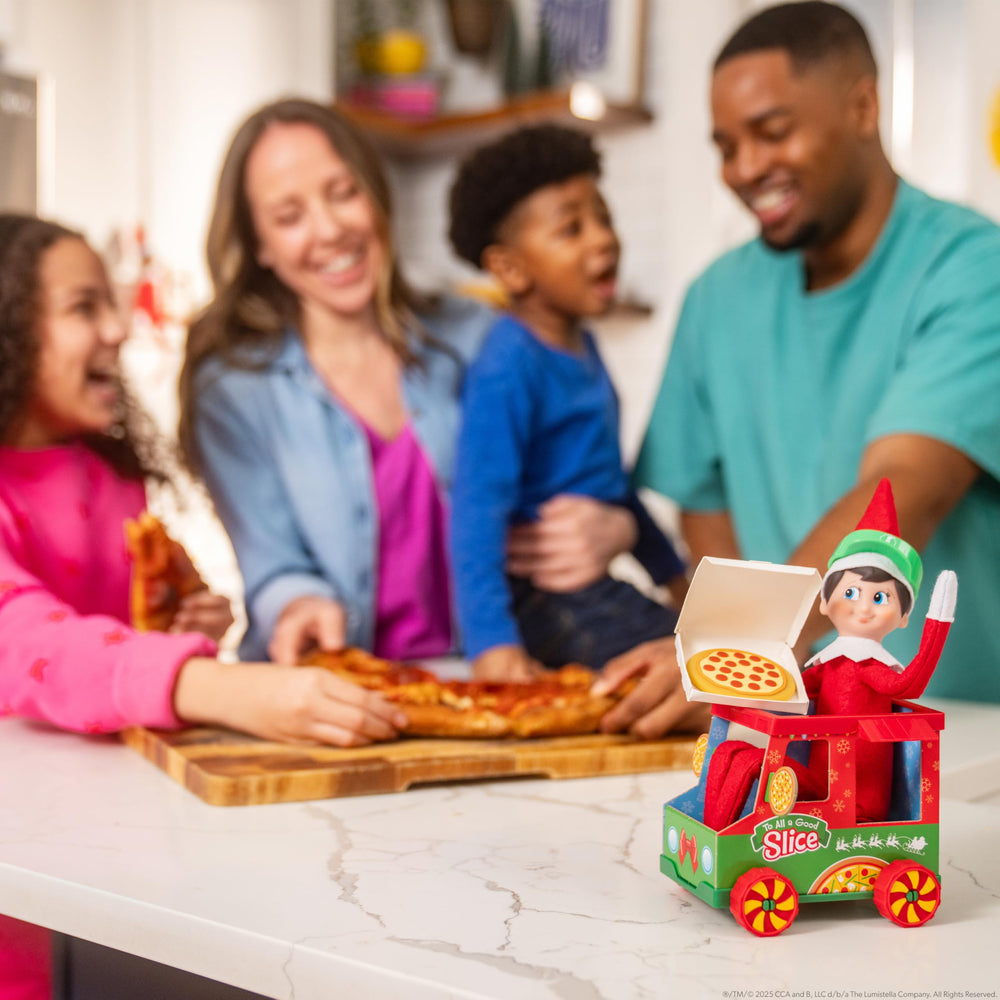 The Elf on the Shelf polar delivery truck sets up North Pole meals.