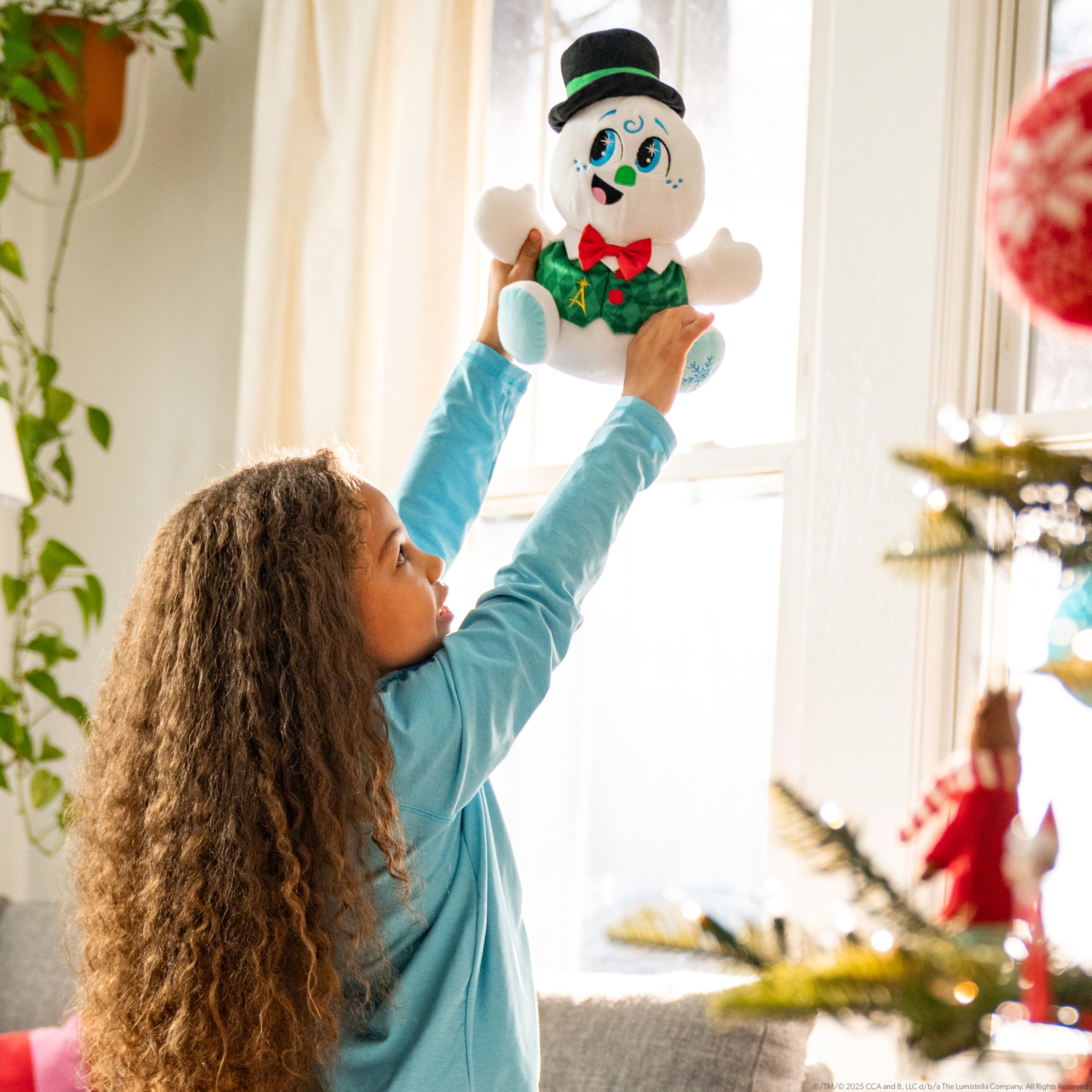 The Elf on the Shelf Razzle plush fabric detail feels soft and cozy.