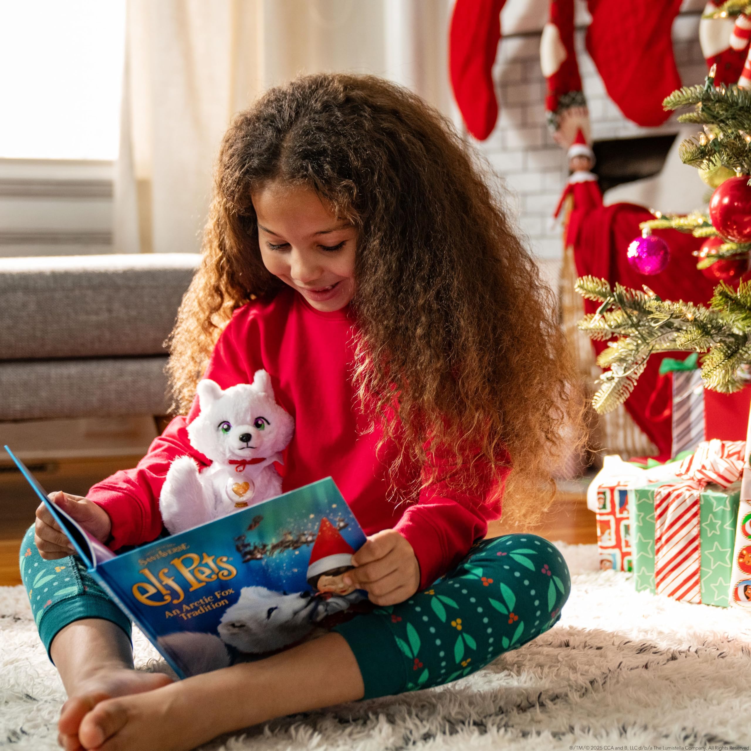 The Elf Pets Arctic Fox in hand suggests easy cuddling during quiet moments and read-aloud time.