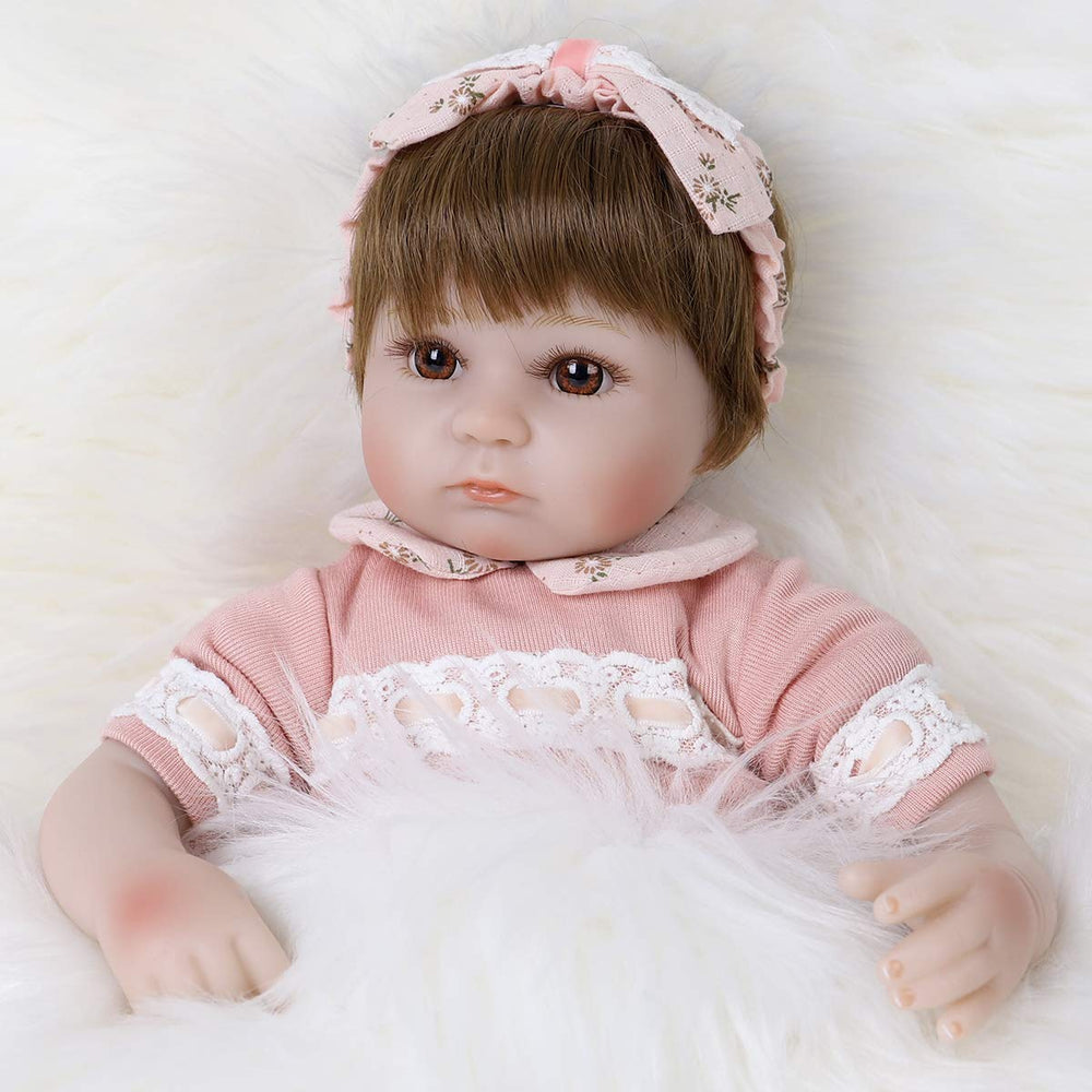ENADOLL Reborn doll fluffy hair ready to be brushed and styled.