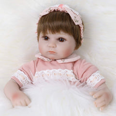 ENADOLL Reborn doll fluffy hair ready to be brushed and styled.