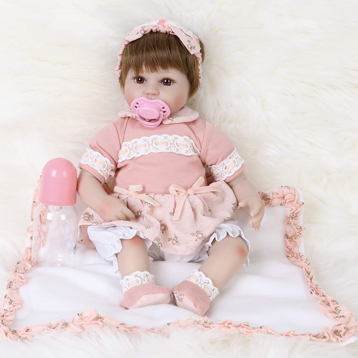 ENADOLL Reborn doll with headband for lifelike, imaginative play and gentle storytelling.