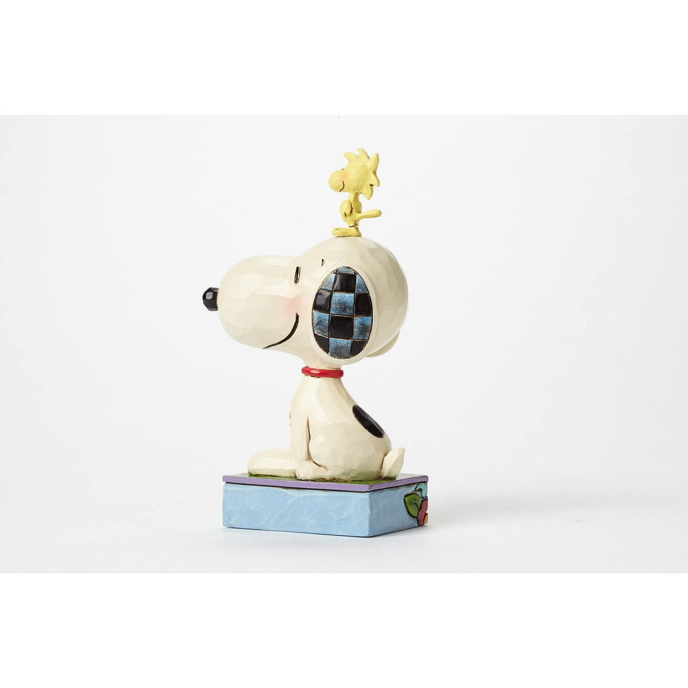 Enesco Jim Shore folk-art quilt-pattern Snoopy and Woodstock figurine brightens any collection