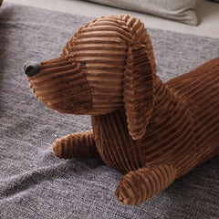 Enhopty closeup dachshund plush fabric suggests plush softness.