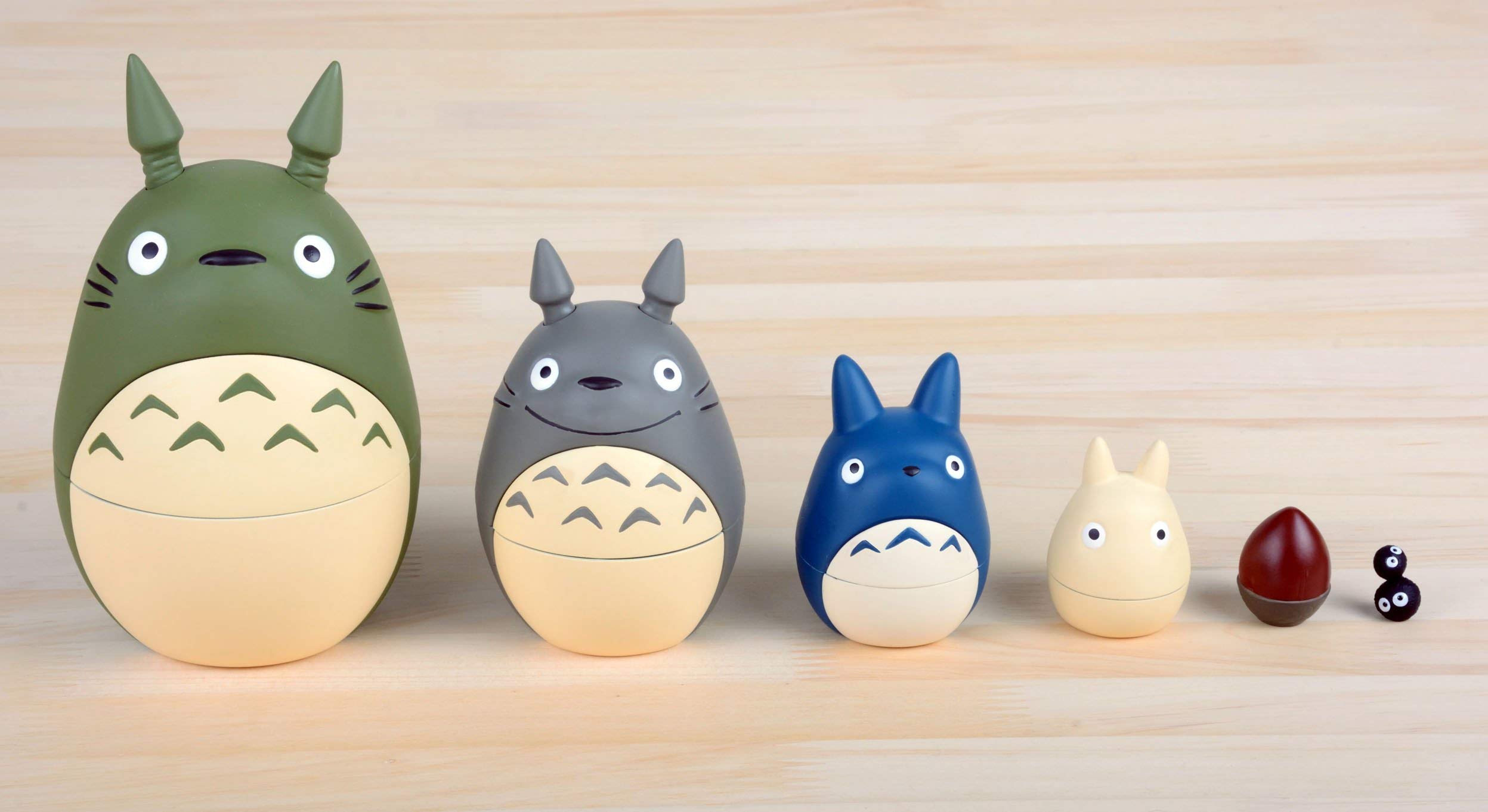 Ensky Totoro nesting dolls on a shelf for charming decor