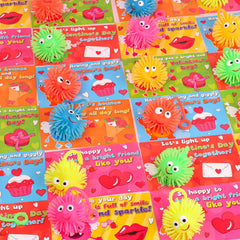 Envotek kids exchanging valentines during a classroom celebration.