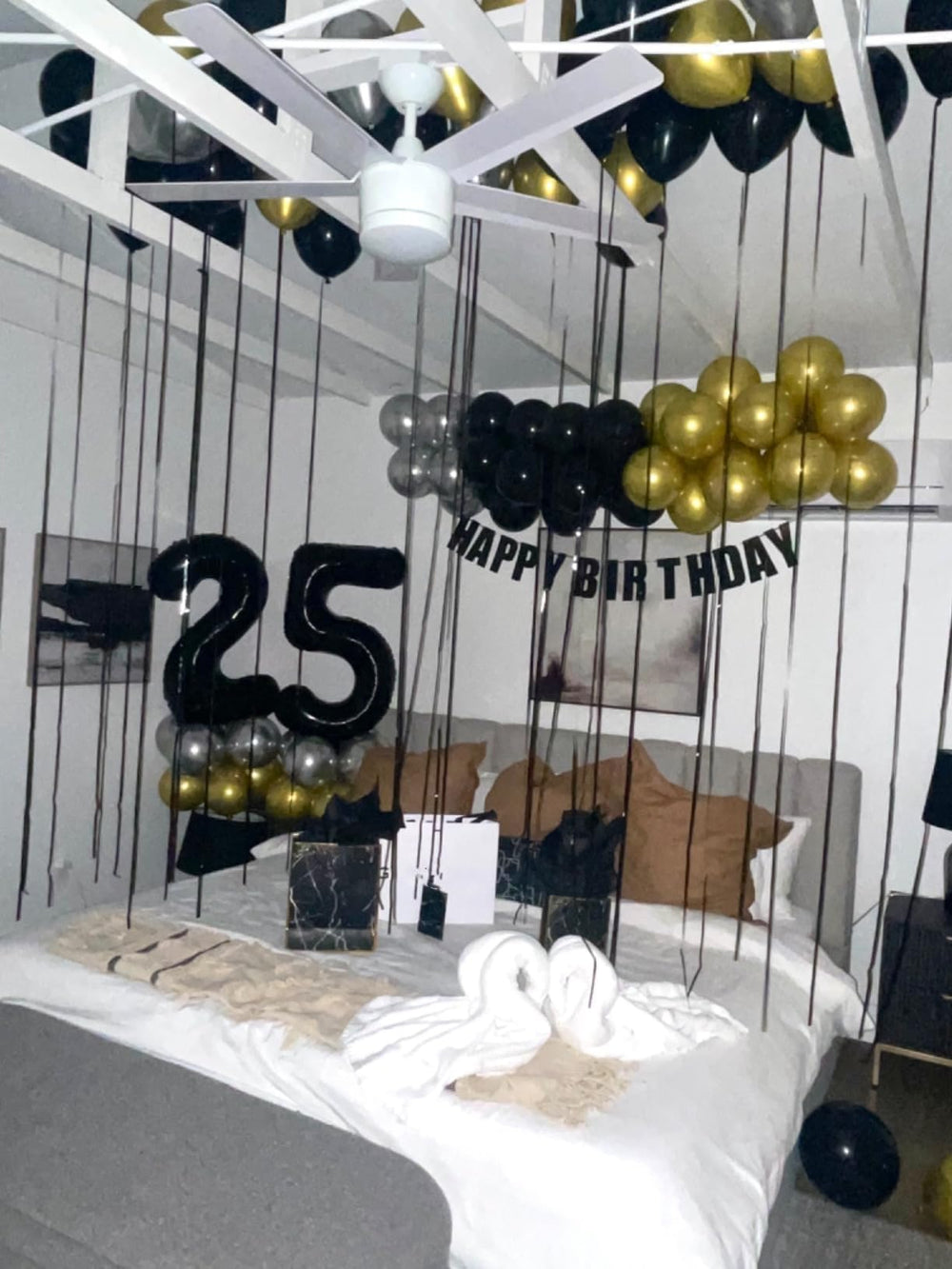 Enyeopd 40-inch silver number balloon pops against dark décor at any party
