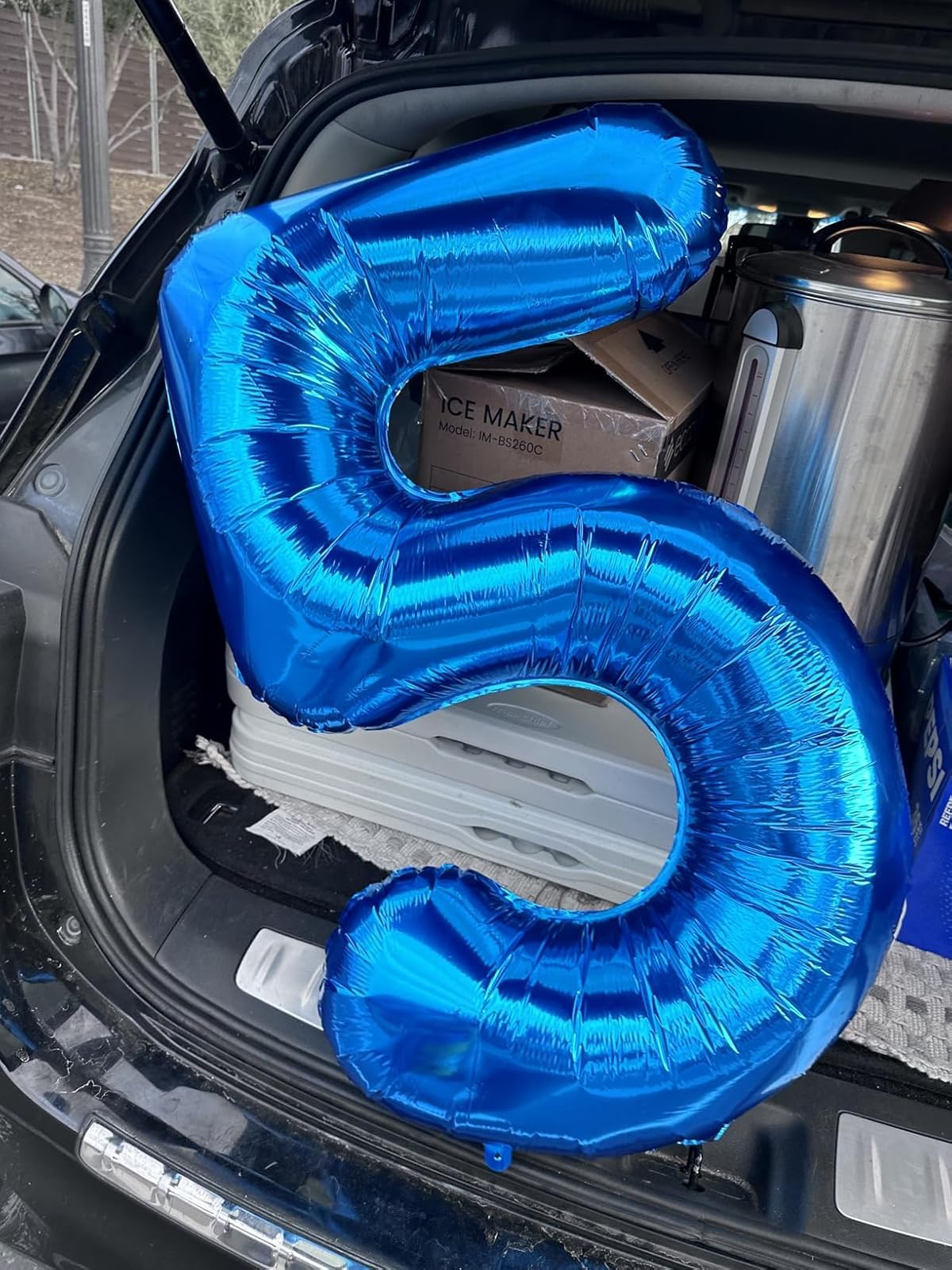 Enyeopd Balloons Number 5 hanging display creates a dramatic focal point