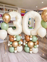 Enyeopd number balloons color options enhance party themes with cream numerals.