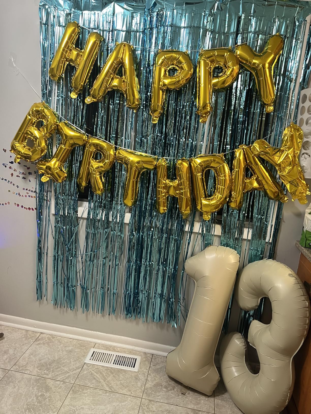 Enyeopd cream number balloons stacked creatively for dramatic displays.