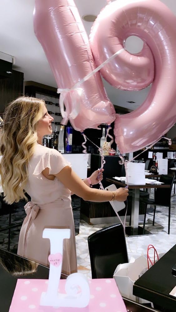 Enyeopd pink 61 number balloon ideal for milestone parties and festive backdrops.