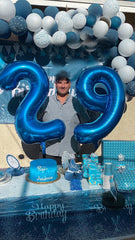 Enyeopd anniversary party balloon emphasizes milestones with sleek dark blue tone.