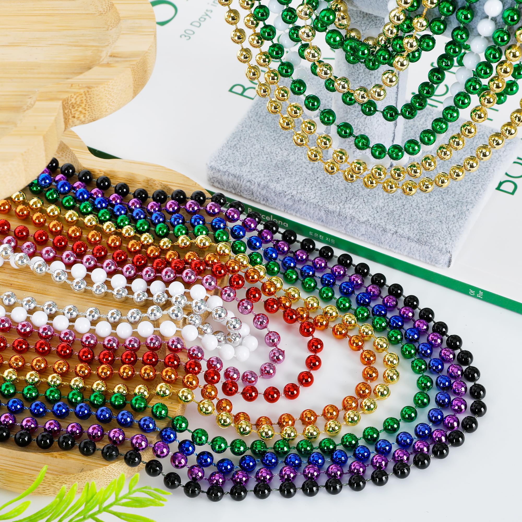 EOBOH 33-inch Mardi Gras necklaces drape smoothly for celebrations.
