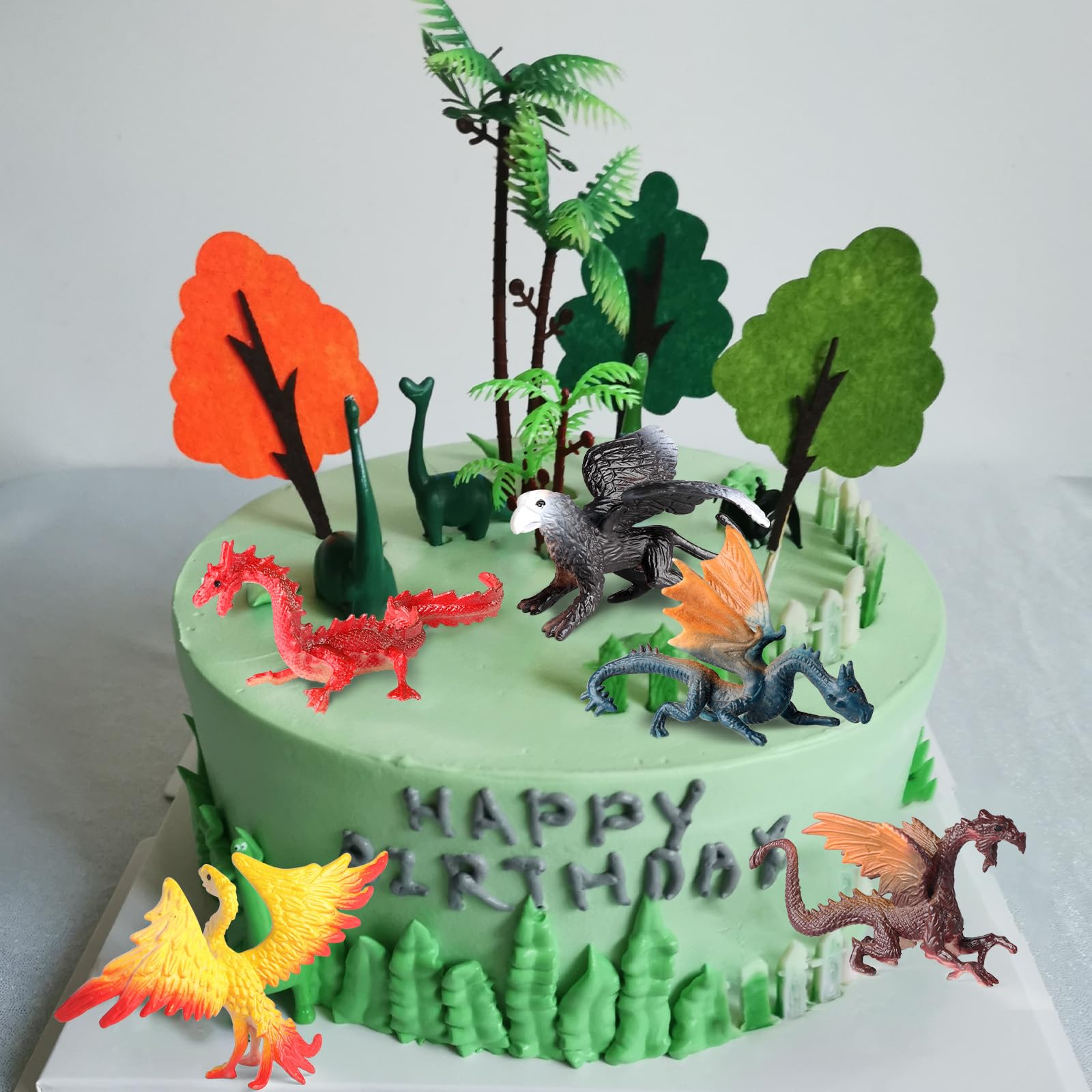 EOIVSH mini dragon figure used as a cake topper for festive celebrations.