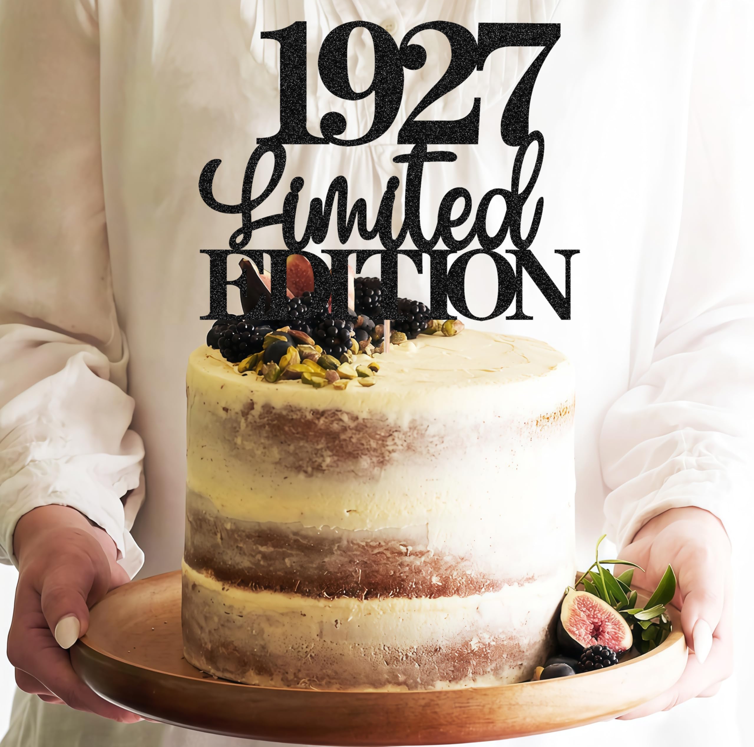 EONNCNT black-glitter cake topper with 1927 emblem enhances party decor.