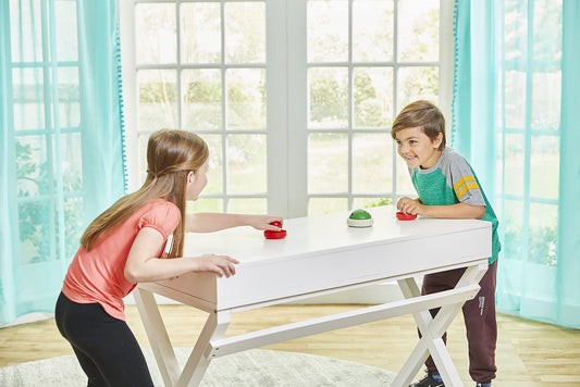 Epoch Games Hover Shell Strike paddle action ready for quick rallies with friends.