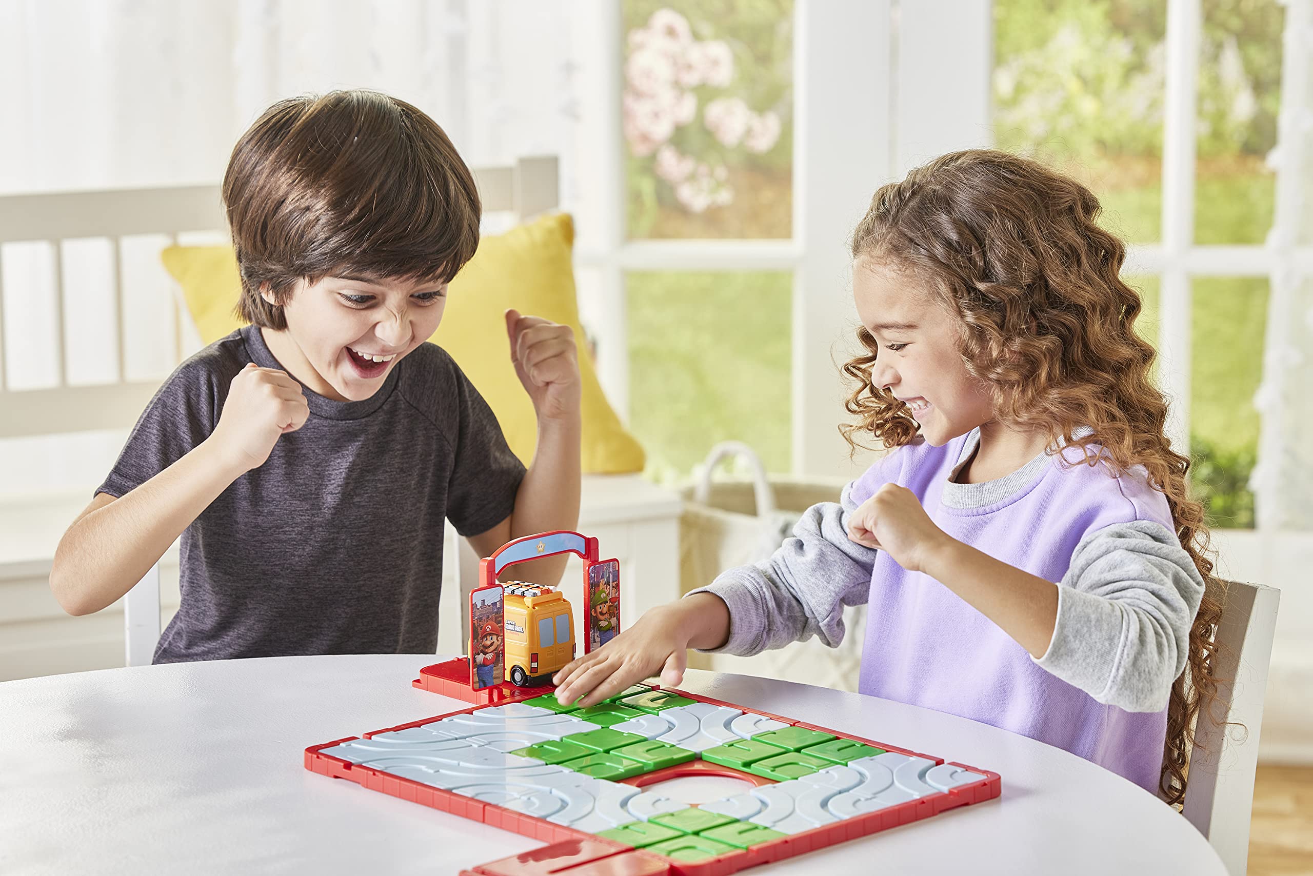 Epoch Games' Super Mario Route 'N Go tiles and base showcase strategic tile sliding.