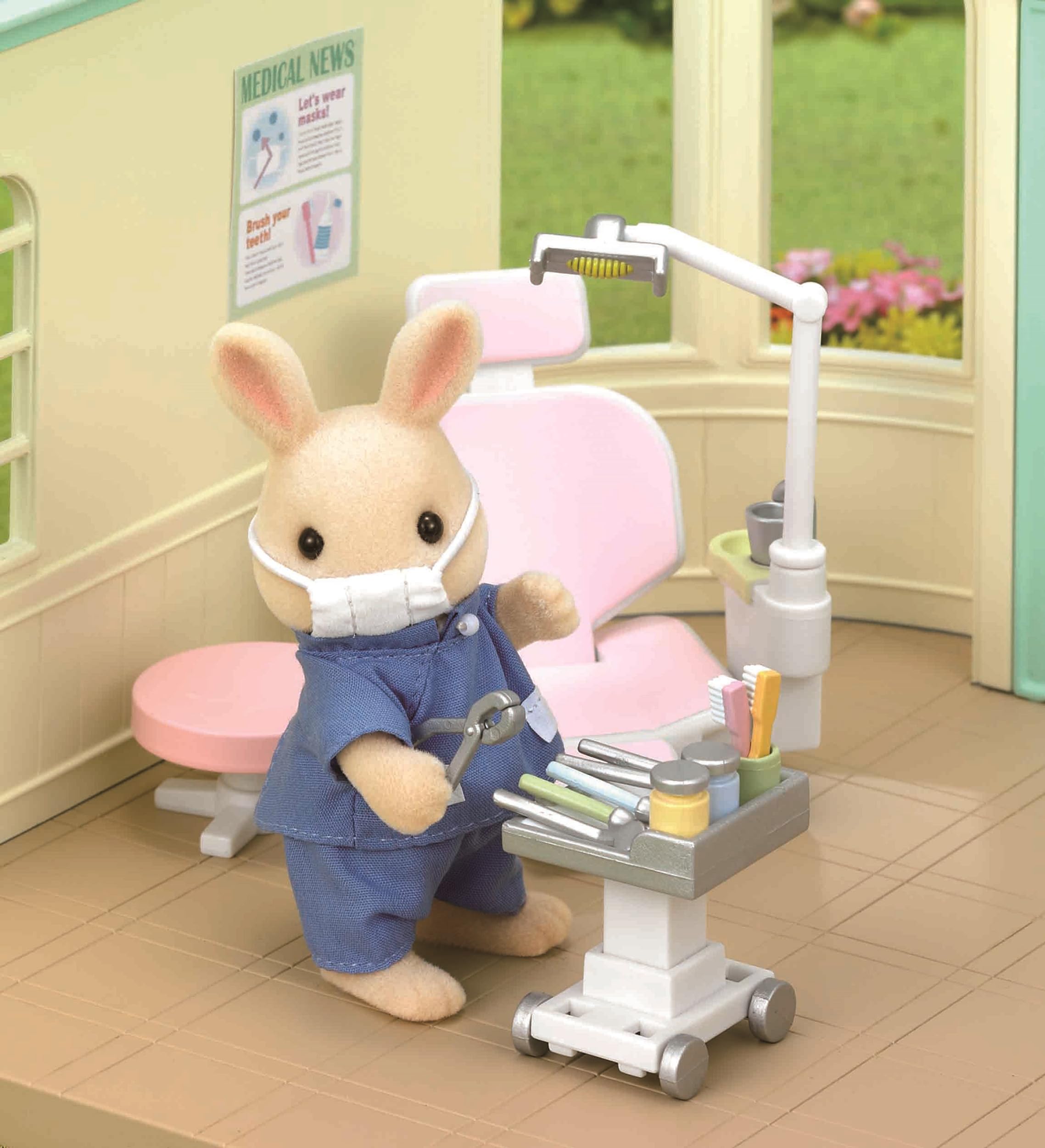 Forest clinic scene with Epoch Sylvanian dentist kit in action
