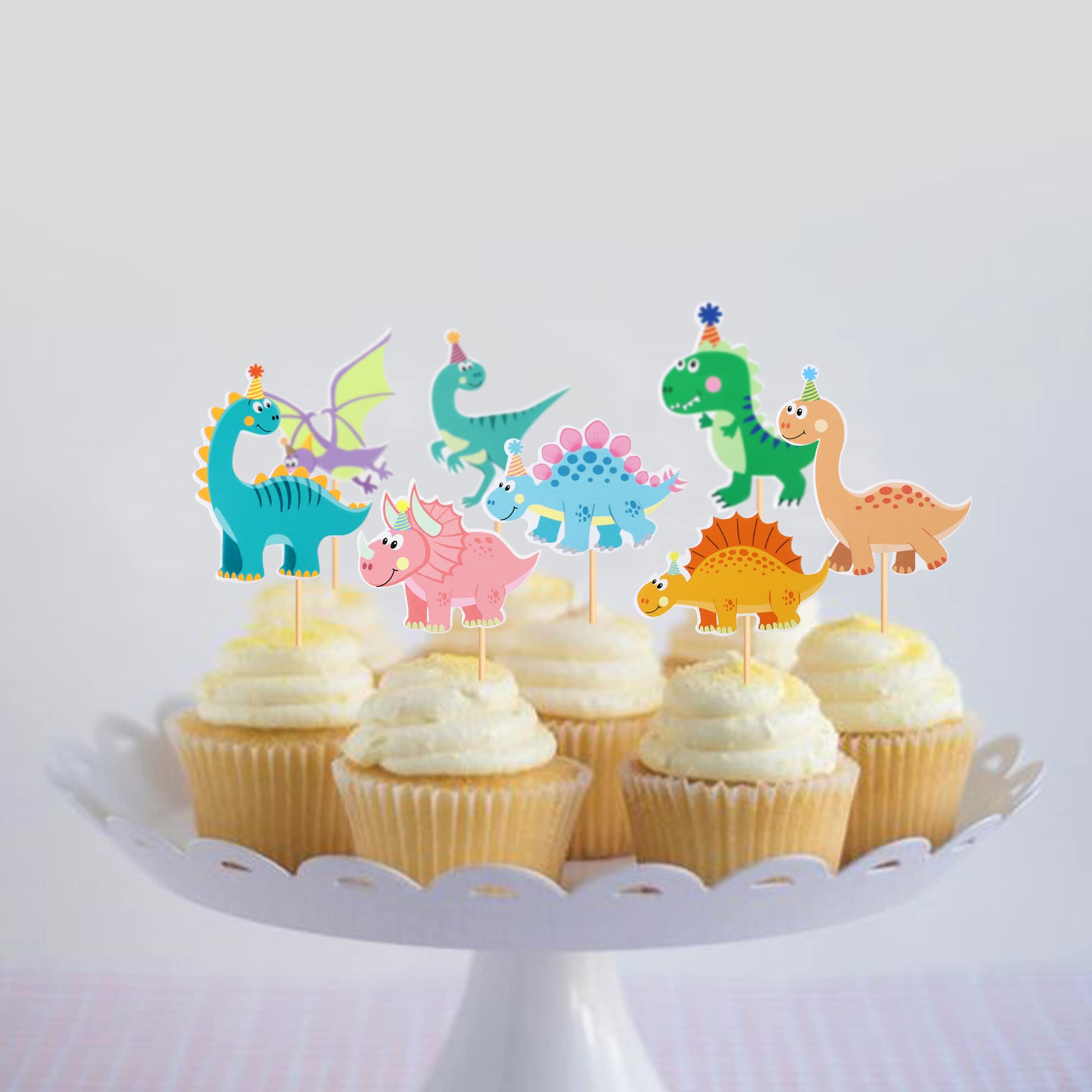 Ercadio dinosaur cupcake topper design E enhances cake presentation