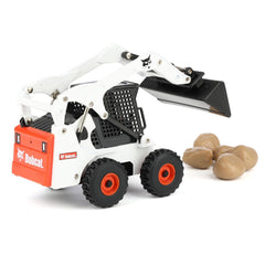 ERTL backhoe boom and bucket for realistic digging play scenarios