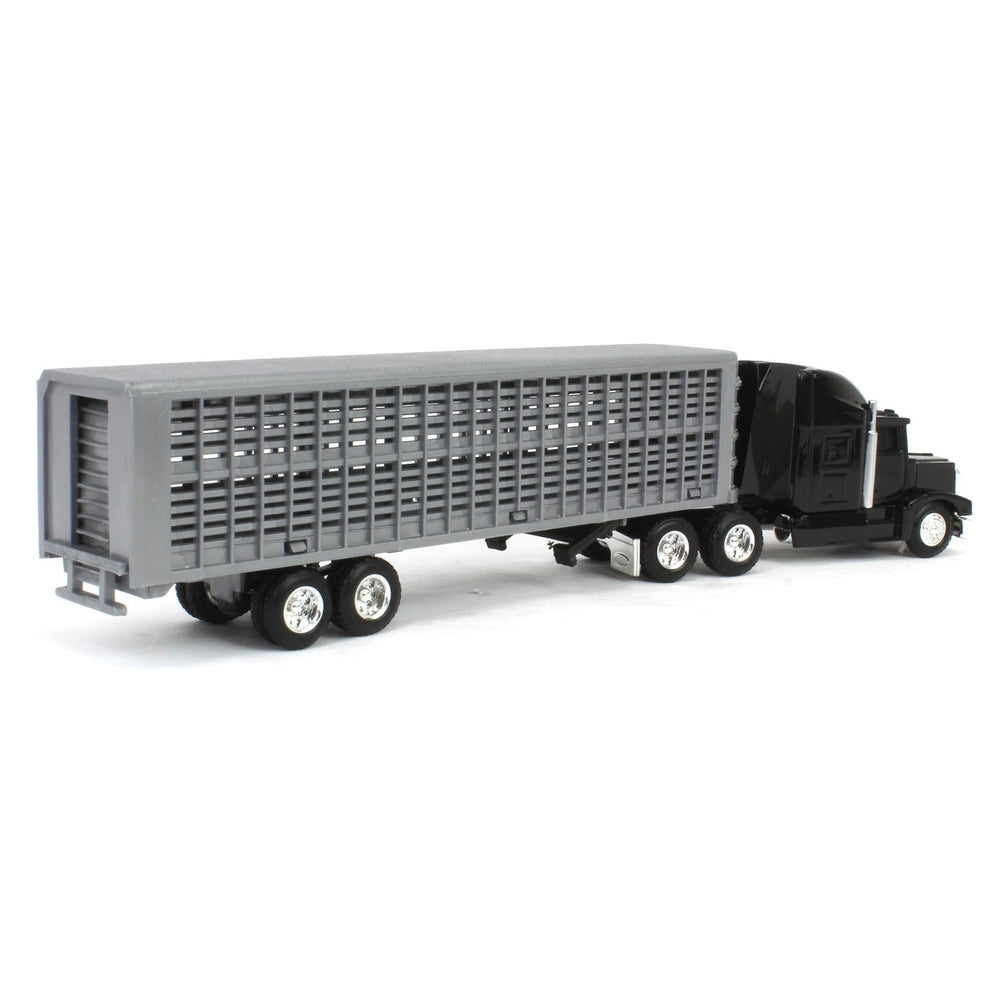 ERTL cattle figures inside trailer for realistic storytelling.