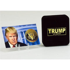 eTradewinds 1-ounce weight Trump coin, striking detail for shelf or desk display.