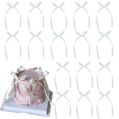 Etwgbaby white bow cupcake toppers for elegant desserts, perfect for weddings and baby showers.
