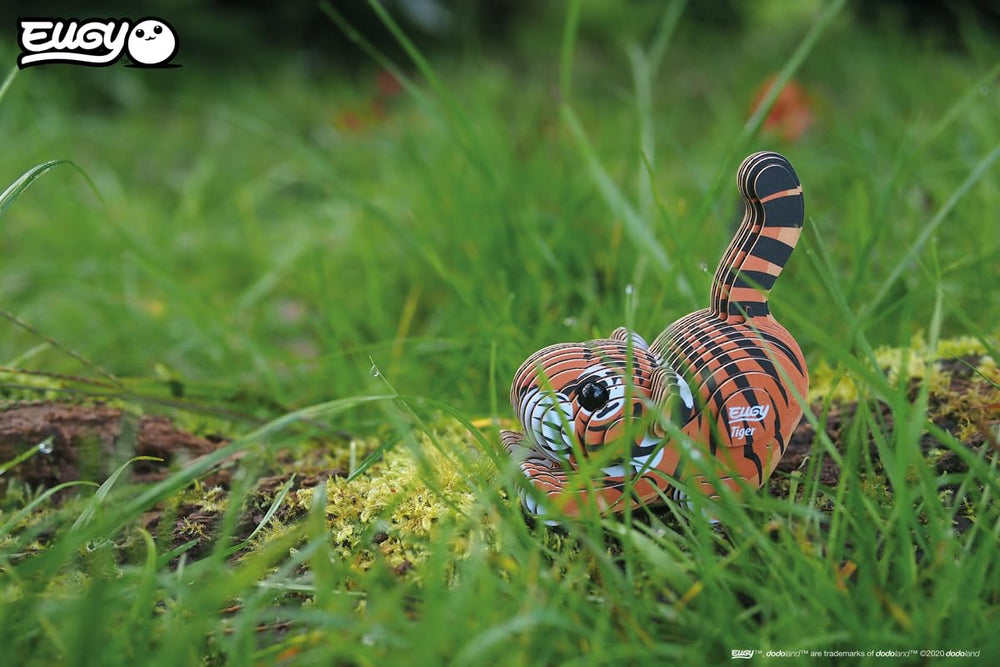 EUGY Tiger 3D puzzle child hands assembling the tiger