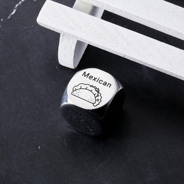 Close-up of rolling Eulalia Eclogue dice during date night