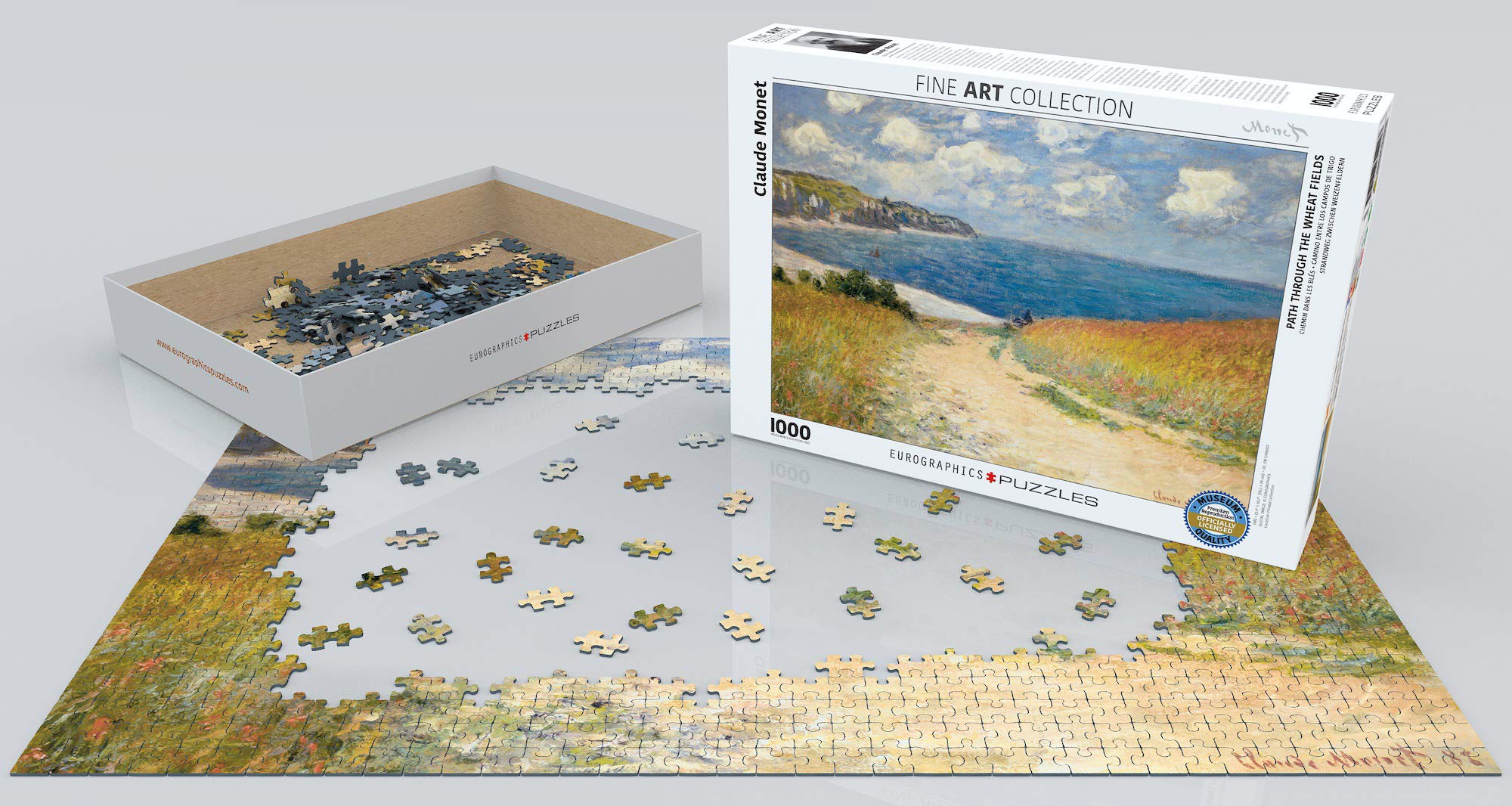 EuroGraphics Monet puzzle pieces on blueboard for lasting enjoyment