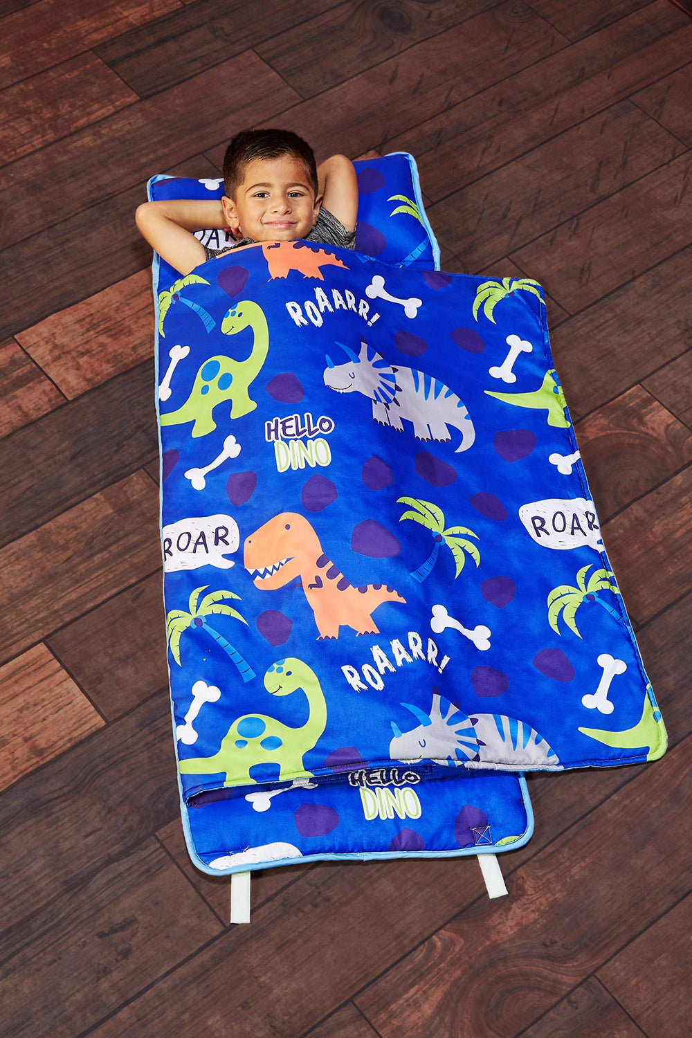 EVERYDAY KIDS Roarin' Dinos nap mat rollup closure simplifies travel and storage.