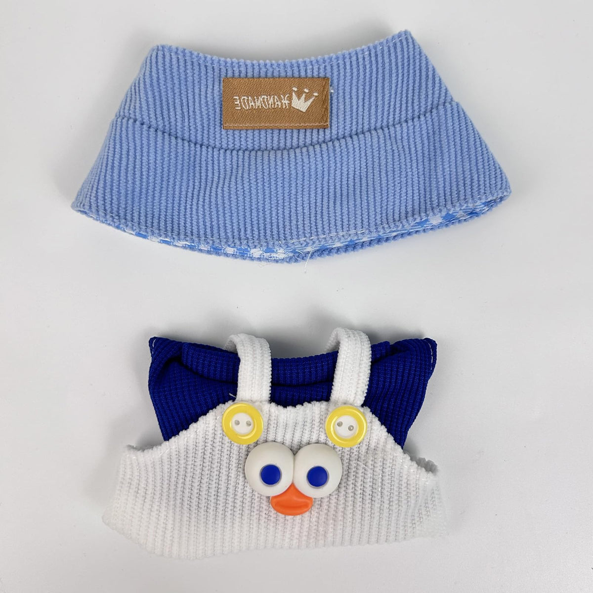 Eyancotoi 17cm doll clothes set with hat and suspenders for easy dress-up.