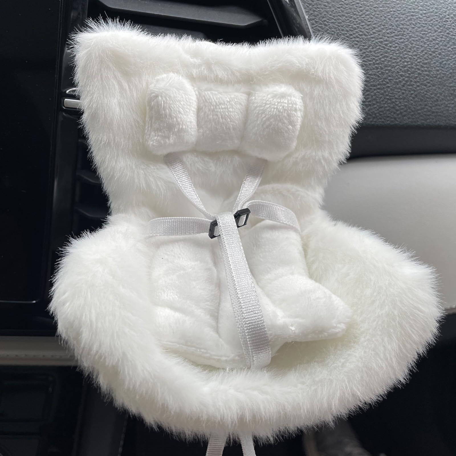 Ezcora doll seat base shows transparent bottom with plush white cushion.