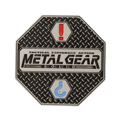 Fanattik Metal Gear Solid coin in protective acrylic cup display.
