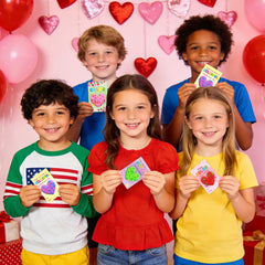 Fancy Land classroom valentines scene with crayons and cards ready to share