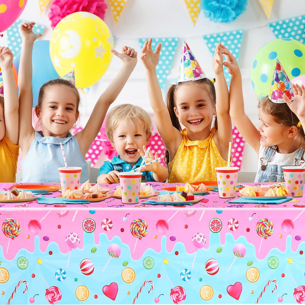 Fanfanwin Candyland tablecloth laid out for candy-themed birthday setup
